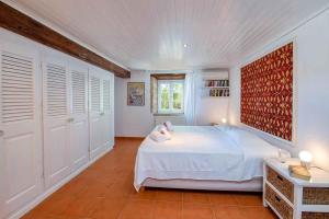 Posteľ alebo postele v izbe v ubytovaní Olive Grove House Paxos Loggos + 22 fotografií