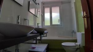 Ein Badezimmer in der Unterkunft Preciosa casa tranquila
