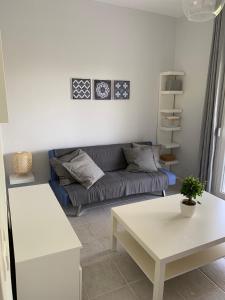 Posezení v ubytování Gerakini apartment