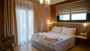 Posteľ alebo postele v izbe v ubytovaní Agnes Deluxe Hotel