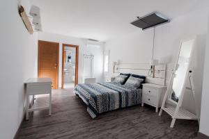 Cama ou camas em um quarto em Apartamento Loft Sopranis