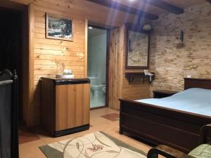 Postel nebo postele na pokoji v ubytování Elf-cottage