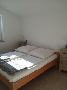 Un pat sau paturi într-o cameră la Villa Iva