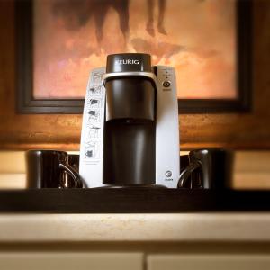
a coffee maker sitting on top of a counter at Rustic Inn Creekside in Jackson
