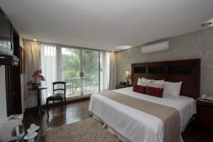 Postel nebo postele na pokoji v ubytování Colombe Hotel Boutique