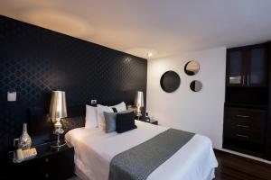 Postel nebo postele na pokoji v ubytování Colombe Hotel Boutique