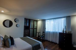 Postel nebo postele na pokoji v ubytování Colombe Hotel Boutique