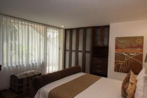 Postel nebo postele na pokoji v ubytování Colombe Hotel Boutique