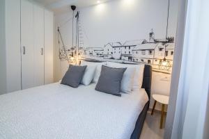 Postel nebo postele na pokoji v ubytování FK Apartments