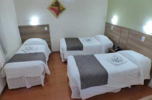 Postel nebo postele na pokoji v ubytování Hotel JB