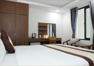 Postel nebo postele na pokoji v ubytování DORADO HOTEL