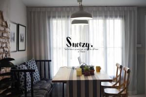 Posezení v ubytování Snoozy Guesthouse