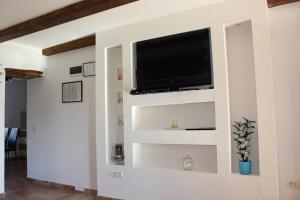 TV a/nebo společenská místnost v ubytování Kuca za odmor Luna