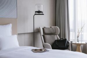 Postel nebo postele na pokoji v ubytování Pullman Shanghai Qingpu Excellence