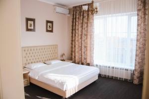 Cama o camas de una habitación en Hotel Riverside