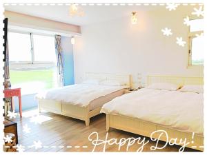 En eller flere senger på et rom på 兆億申襄采民宿1741 Zhao Yì Shen Xiang Cai Homestay 1741