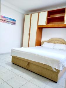 Ένα ή περισσότερα κρεβάτια σε δωμάτιο στο Apartment Tabakovic