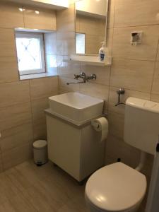 Koupelna v ubytování Schmidt Apartman 2.