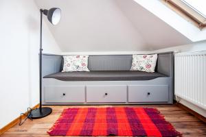 Posteľ alebo postele v izbe v ubytovaní Apartmány Nevädza