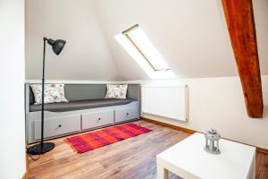 Posteľ alebo postele v izbe v ubytovaní Apartmány Nevädza