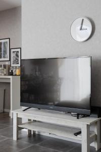 TV a/nebo společenská místnost v ubytování KANADE House