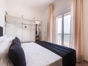 Postel nebo postele na pokoji v ubytování Hotel Florence