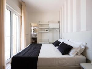 Postel nebo postele na pokoji v ubytování Hotel Florence