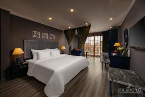 Voodi või voodid majutusasutuse Matilda Boutique Hotel & Spa toas