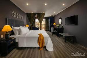 Voodi või voodid majutusasutuse Matilda Boutique Hotel & Spa toas
