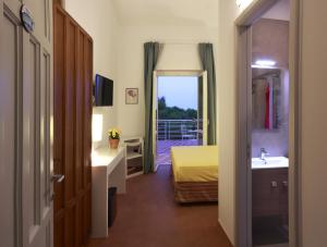 Letto o letti in una camera di Dimora Villa Serena Porto Selvaggio