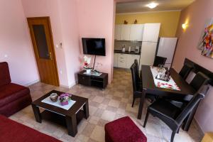 TV a/nebo společenská místnost v ubytování Apartment Medved