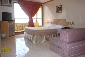 Postel nebo postele na pokoji v ubytování Elegant Circle Inn + 37 fotografií