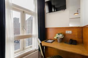 Μια τηλεόραση ή/και κέντρο ψυχαγωγίας στο Hotel van Gelder