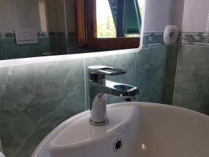 A bathroom at Piccolo Poggio Apartments