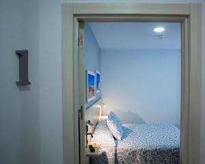 Posteľ alebo postele v izbe v ubytovaní Hotel Bari