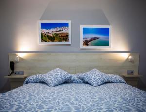 Posteľ alebo postele v izbe v ubytovaní Hotel Bari