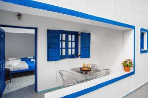 Roula Villa Studios & Apartments客房内的一张或多张床位