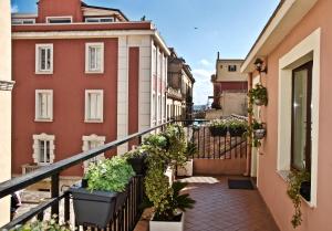 En balkon eller terrasse på Cagliari Marina House