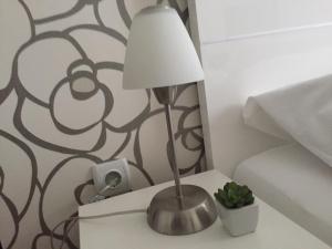 Voodi või voodid majutusasutuse B&B Alex18 toas