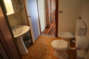 Kúpeľňa v ubytovaní Albergo Del Ponte
