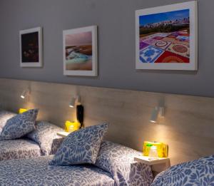 Posteľ alebo postele v izbe v ubytovaní Hotel Bari