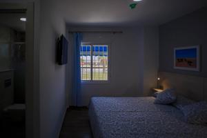 Posteľ alebo postele v izbe v ubytovaní Hotel Bari