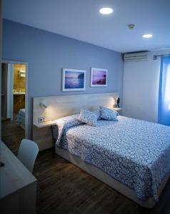 Posteľ alebo postele v izbe v ubytovaní Hotel Bari