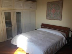 Postel nebo postele na pokoji v ubytování Casa Loretta