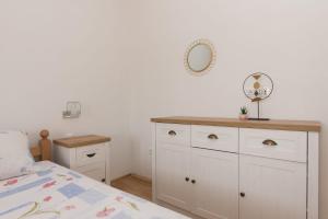 Postel nebo postele na pokoji v ubytování Apartment Oli