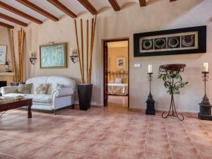 a living room with a couch and a table at Villa Villa Adelfa by Interhome in Jávea +41 photos