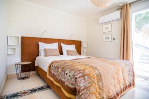 Postel nebo postele na pokoji v ubytování Casa Verde Guesthouse + 28 fotografií