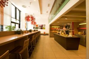 Restoran või mõni muu söögikoht majutusasutuses Ibis Wien Messe