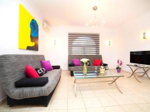 Posezení v ubytování Villa Charme by Interhome