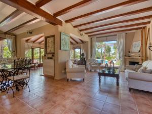 a large living room with a wooden ceiling at Villa Villa Adelfa by Interhome in Jávea